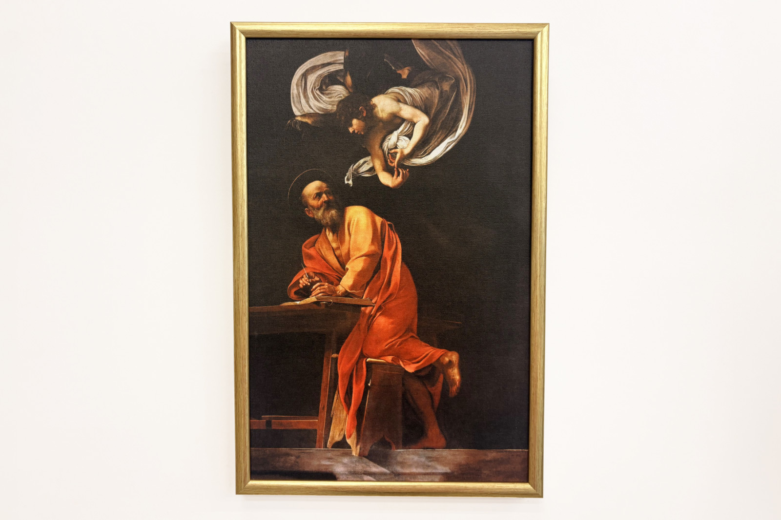 Pyhän Matteuksen inspiraatio - Michelangelo Merisi Caravaggio