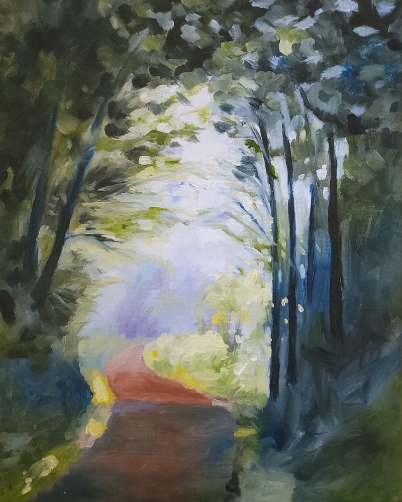 Auringonvalossa kylpevä metsäpolku tekijältä Claire Whitehead