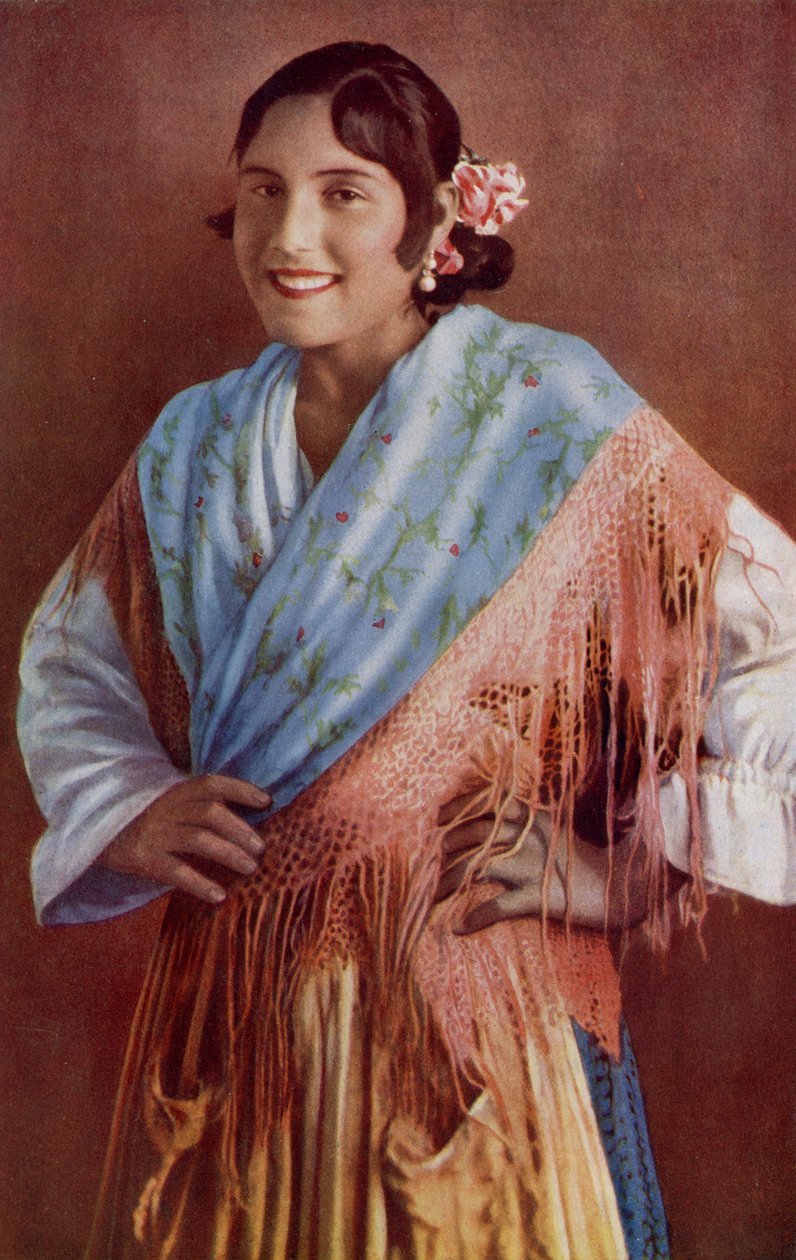 Espanja. Espanjalainen Señorita, jolla on kirkkaat silmät ja lumoava hymy tyypillisessä mekossa. 1920 tekijältä Unknown
