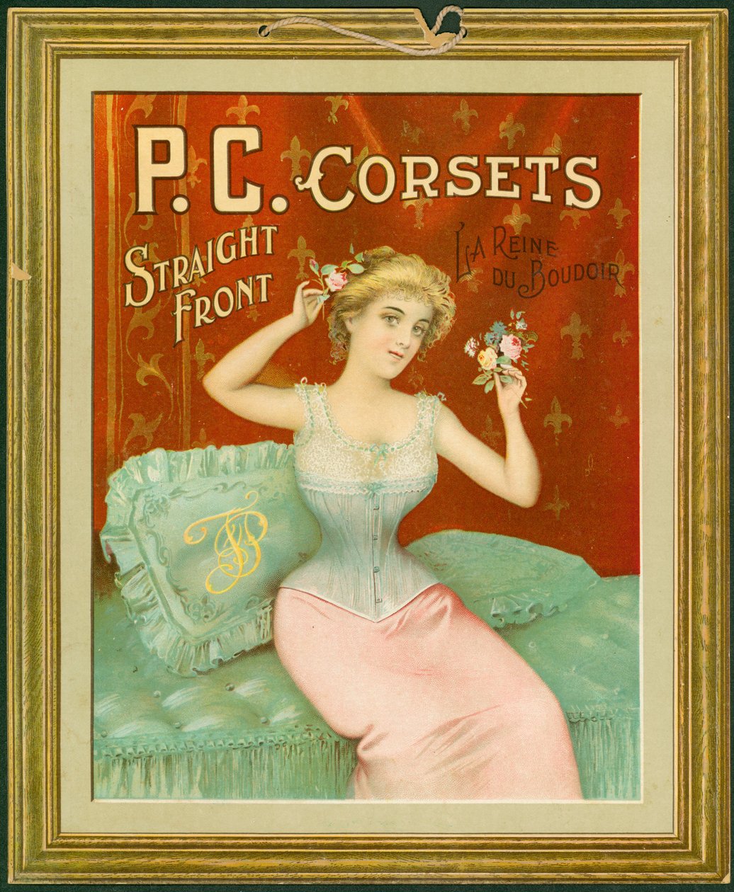 P.C. Korsetit, suora etuosa, La Reine Du Boudoir (värinen lito kortilla ripustusnauhalla) tekijältä American School