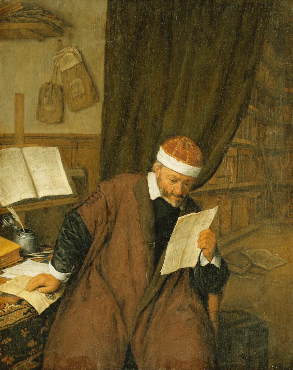 Asianajaja istuu pöydän ääressä lukemassa kirjettä, kirjasto takana, 1668 tekijältä Adriaen Jansz. van Ostade