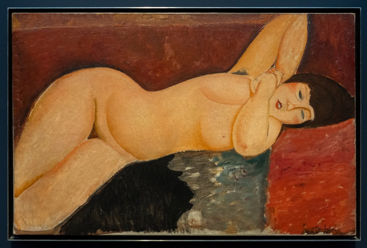 Makaava nainen alasti ja kietoutuneet kädet tekijältä Amedeo Modigliani