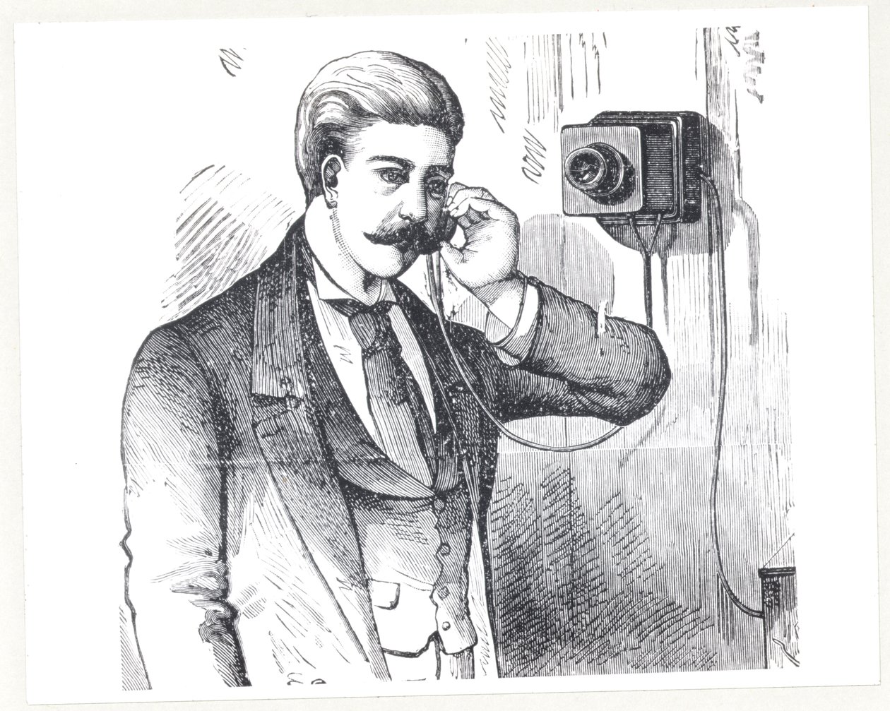 Lauhdutinpuhelin käytössä, The Electric Telephonesta, kirjoittanut George Bartlett Prescott (s.1830), 1890 tekijältä American School