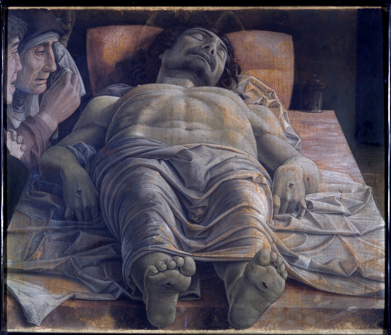 Valituslaulu kuolleesta Kristuksesta, n. 1483 (tempera kankaalle) tekijältä Andrea Mantegna