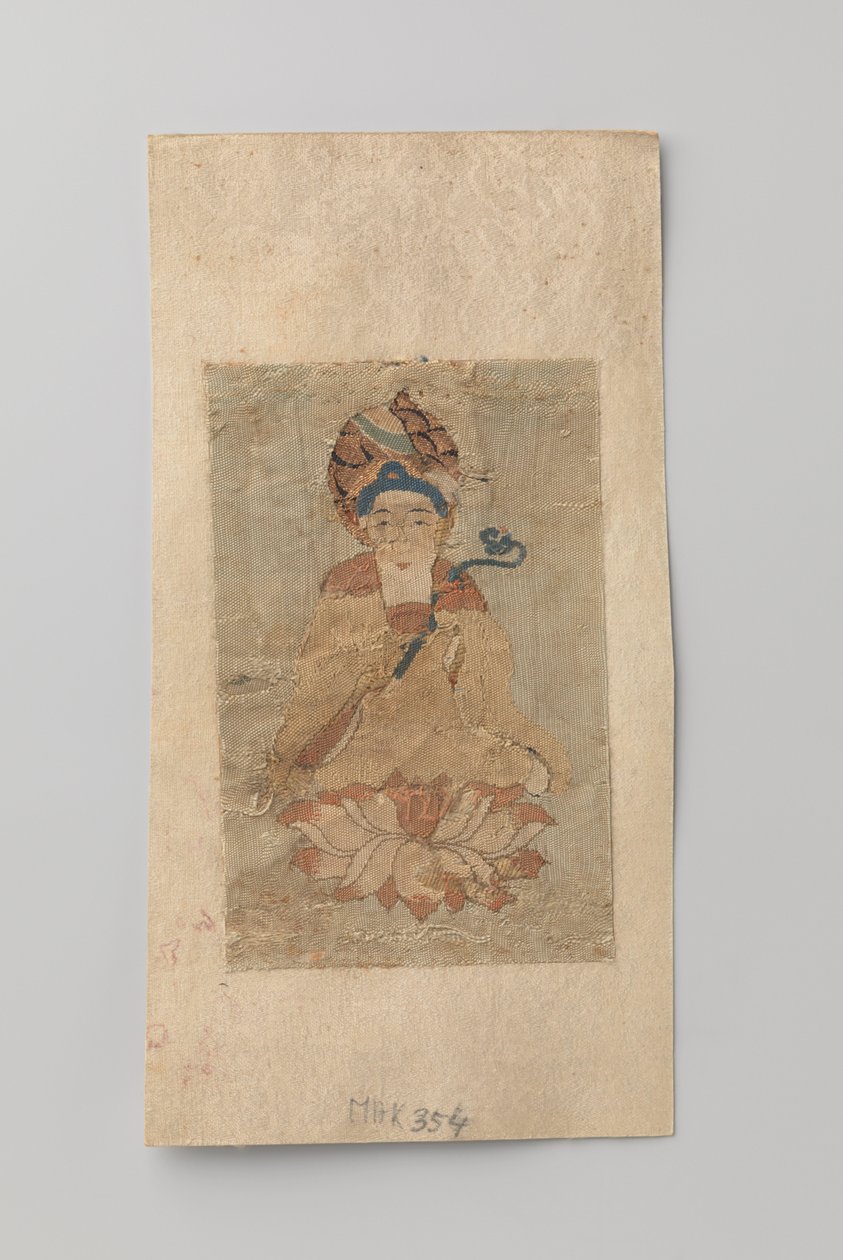 Buddha ruyi kädessään, istuu lootuksen päällä tekijältä Anonymous