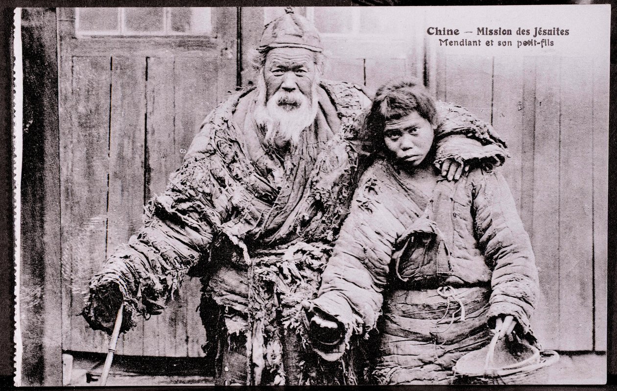 Vanha kerjäläinen pojanpojan kanssa Valokuva 1900-luvun alusta - Yksityiskokoelma tekijältä Anonymous Anonymous