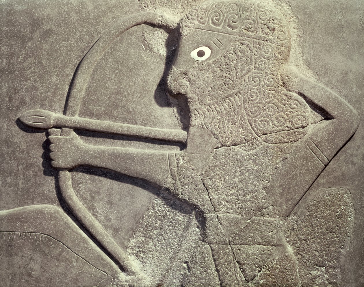 Metsästäjää kuvaava reliefi Tell-Halafista, Syyriasta (basaltti) (yksityiskohta) tekijältä Assyrian