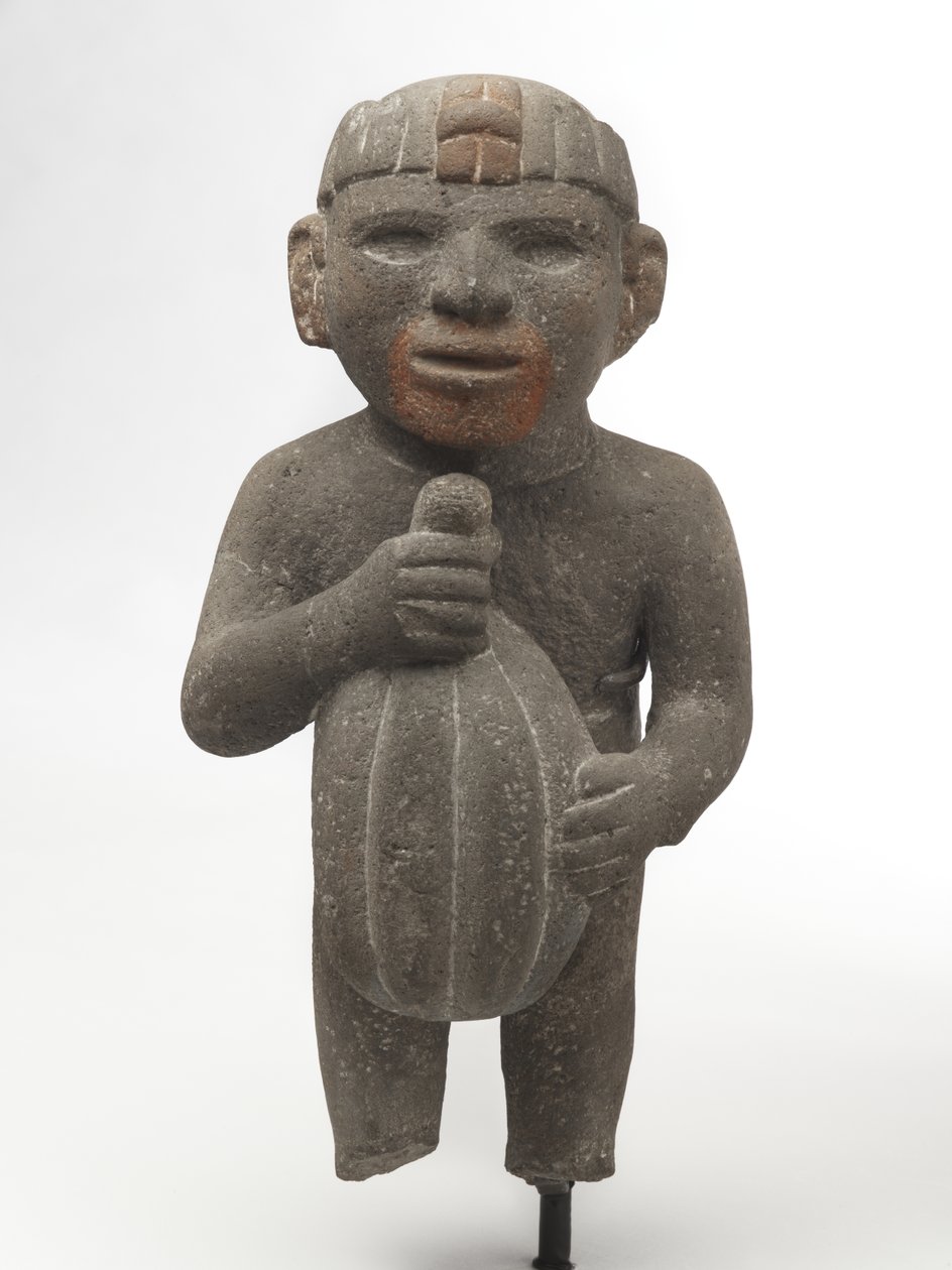 Mies kantaa kaakaopalkoa, 1440-1521 (vulkaaninen kivi, jossa on jälkiä punaisesta pigmentistä) tekijältä Aztec