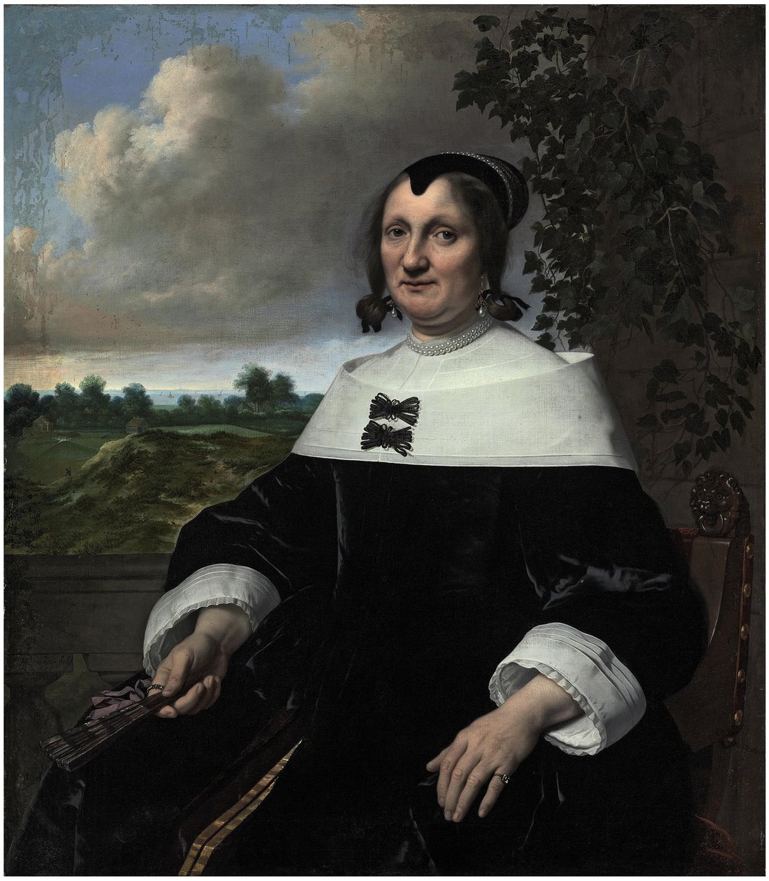 Muotokuva naisesta, luultavasti Hester du Pire, joka istuu kaiteen edessä viuhka kädessään, näkymä merelle. tekijältä Bartholomeus van der Helst