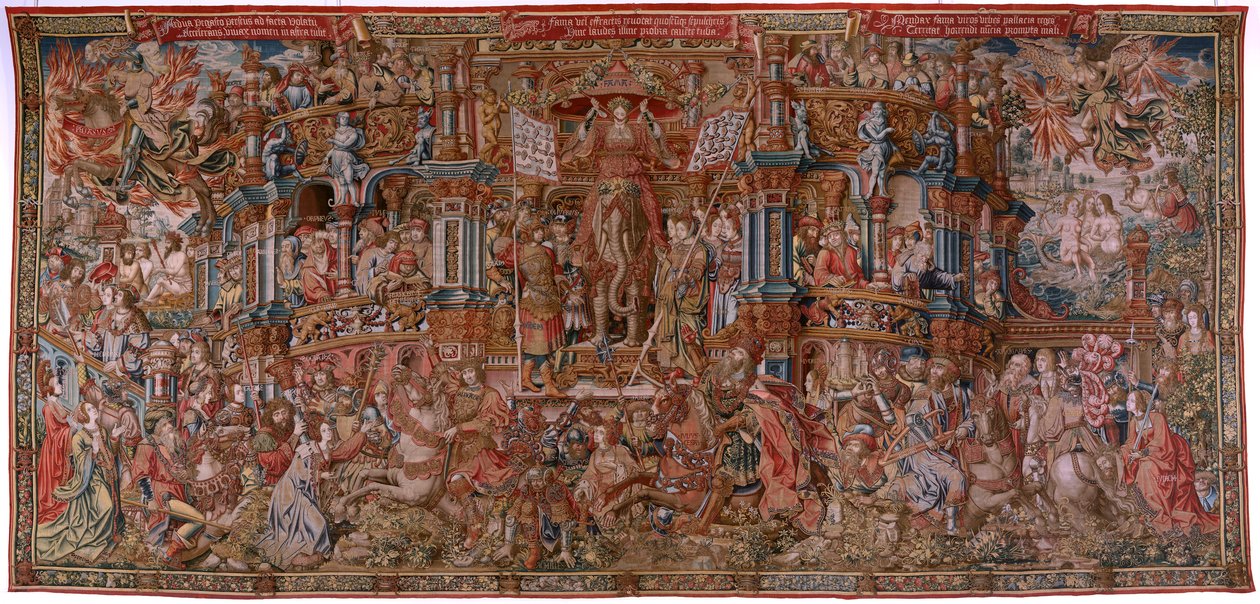 Flanderin kuvakudos. Sarja The Honours. Fame (La Fama). Sarjan kolmas kuvakudos. Mallisarjakuvapiirtäjät Bernard van Orleyn ja Jan Gossaertin (Mabuse) piiristä. Valmistus Pieter van Aelst, Bryssel. Noin 1550. Kangas Kulta, hopea, silkki ja villa. tekijältä Bernard van Orley