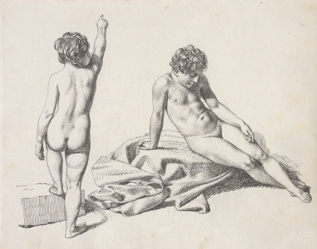 Dues nenes nues, una asseguda per davant i l