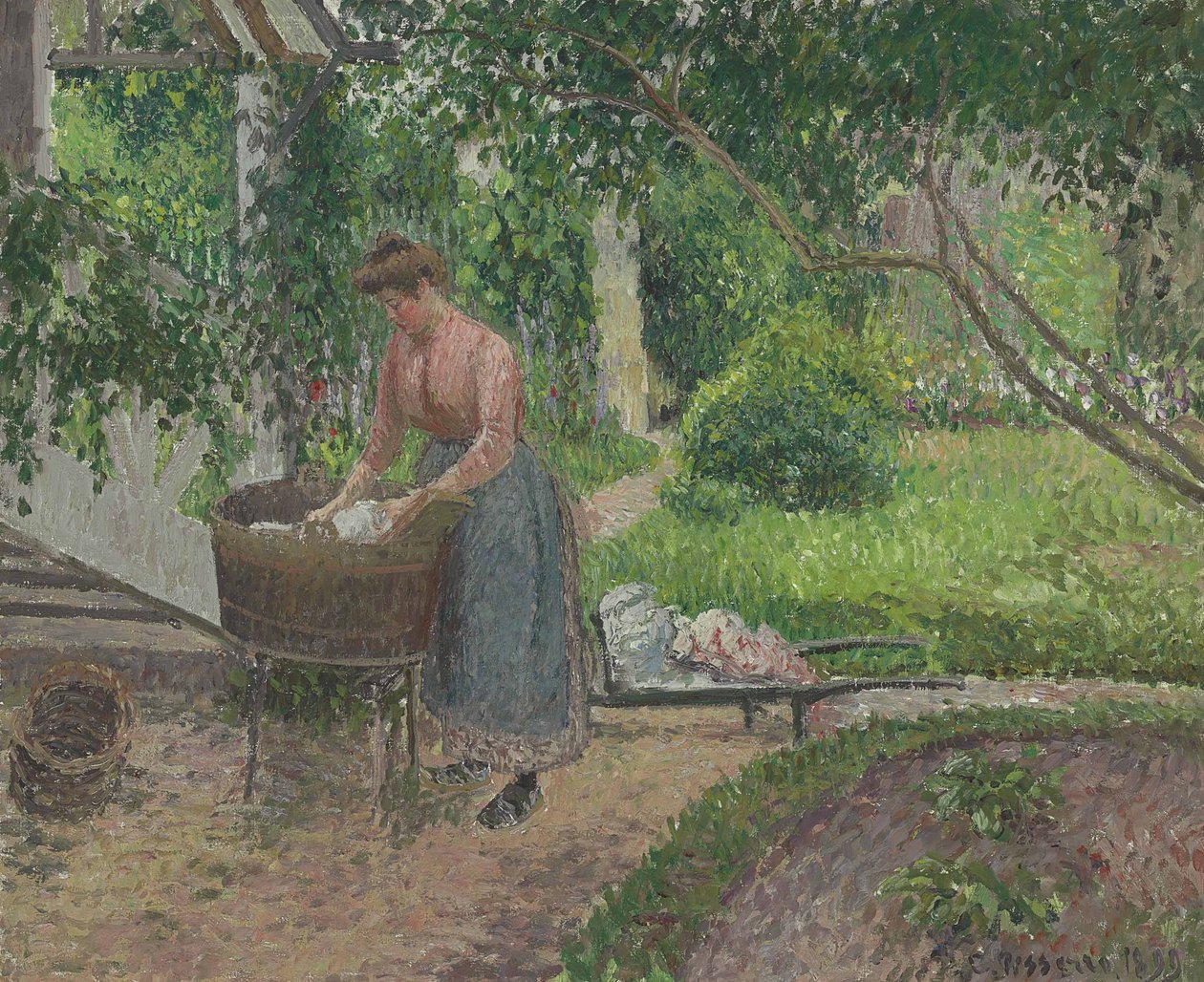 Laveuse dans le jardin dEragny tekijältä Camille Jacob Pissarro