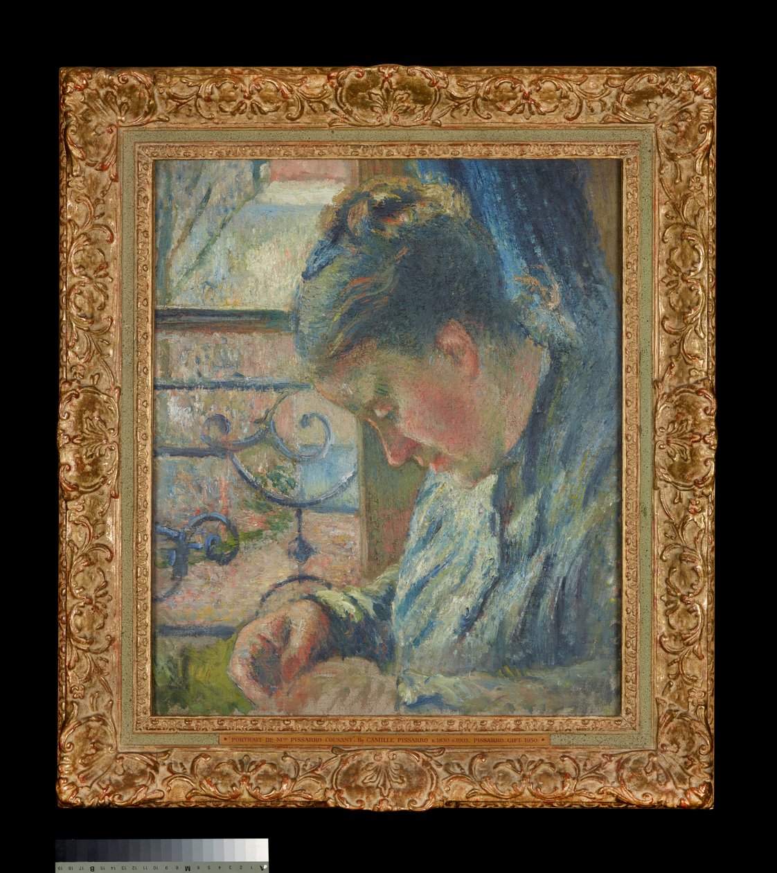 Julie Pissarro Ompelu ikkunan vieressä tekijältä Camille Pissarro