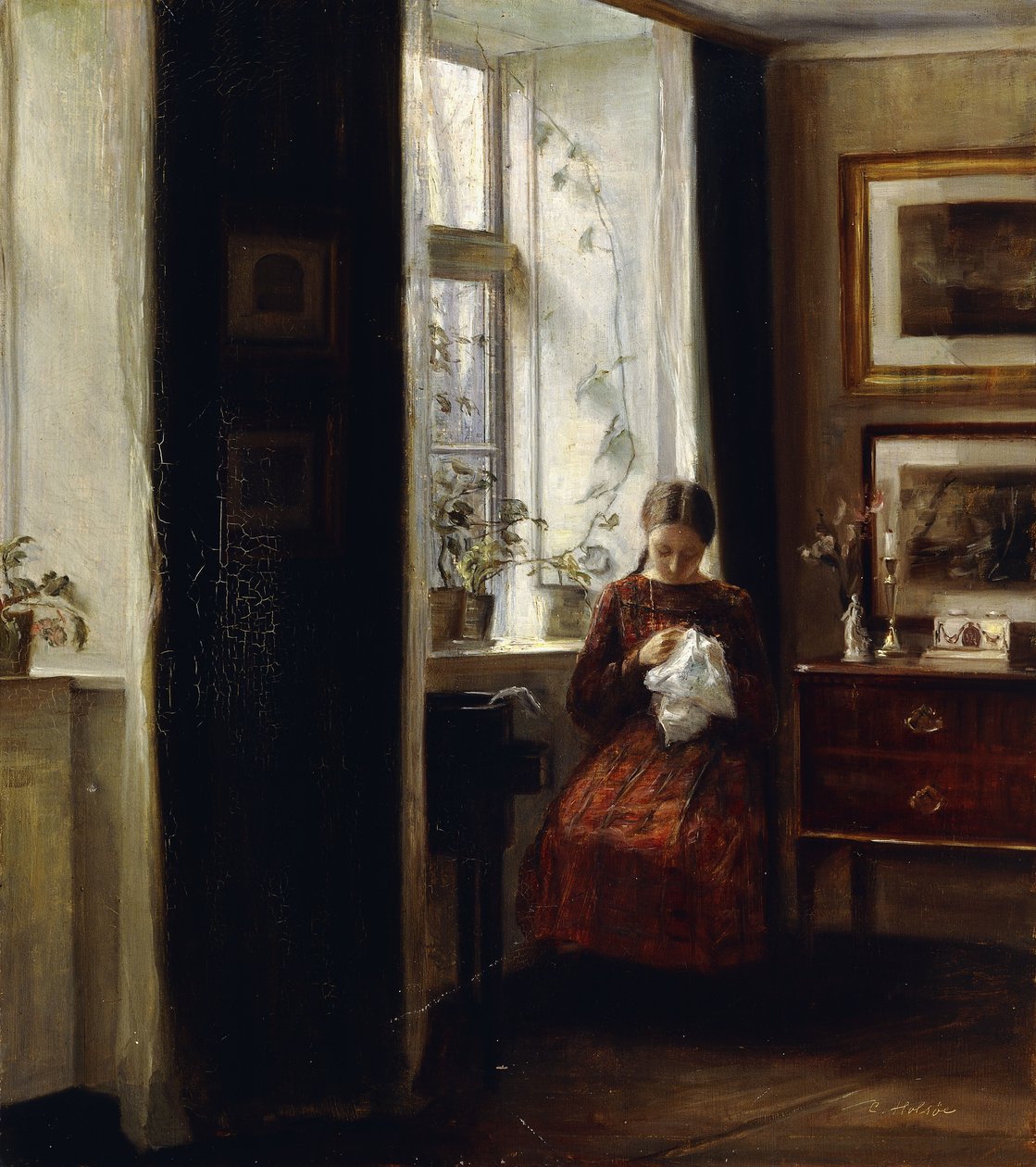 Nuori tyttö ompelee tekijältä Carl Holsoe