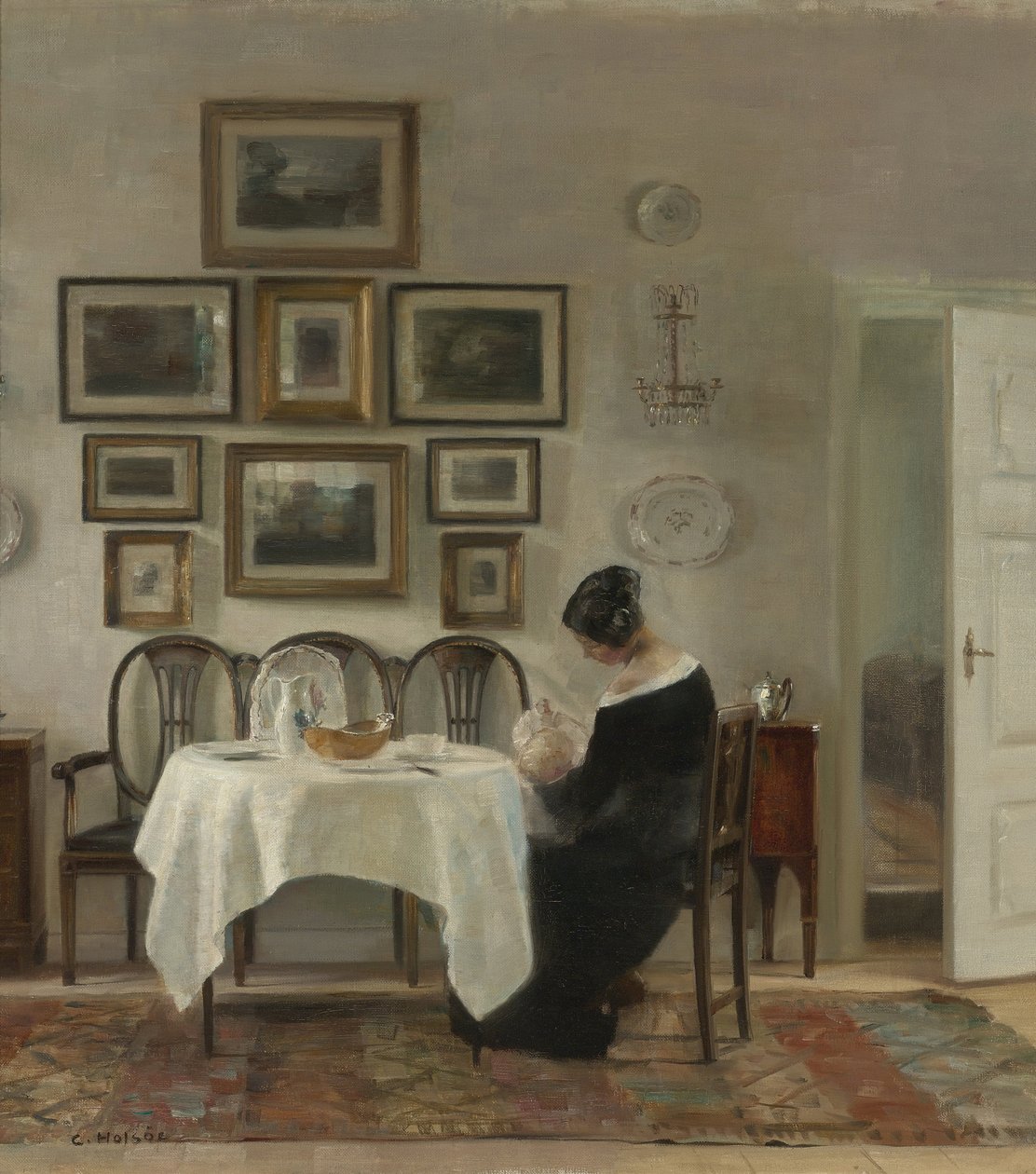 Äiti ja lapsi pöydässä par Holsoe, Carl (1863-1935), - Öljy kankaalle, 75,2x68,2 - Yksityiskokoelma tekijältä Carl Holsoe