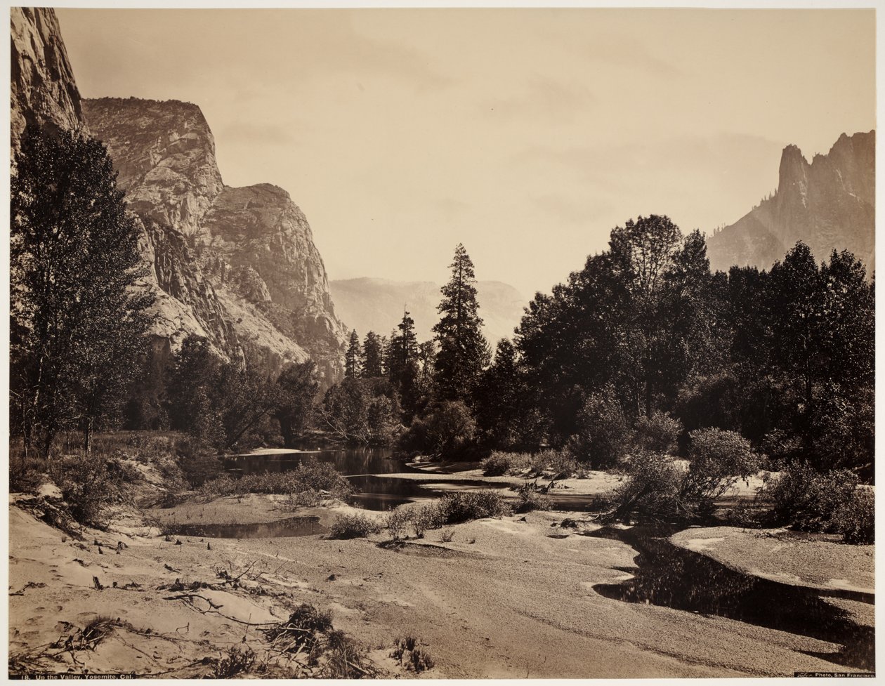 Yosemiten laakson ylhäältä El Capitanin juurelta käsin tekijältä Carleton Emmons Watkins