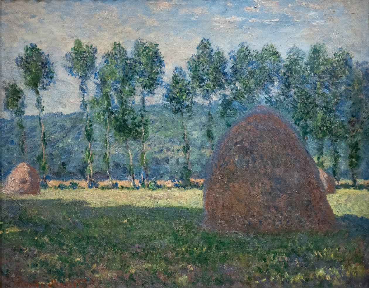 Heinäsuovasta lähellä Givernyä tekijältä Claude Monet