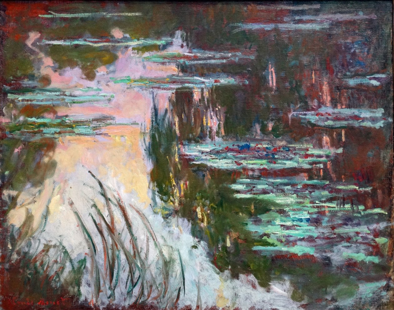 Vesililjat, laskeva aurinko tekijältä Claude Monet