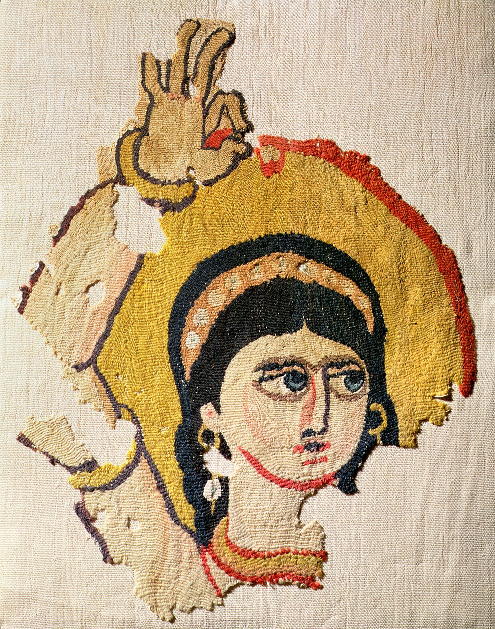Fragmentti kuvakudos, joka kuvaa tanssijan päätä (villaa ja pellavaa) tekijältä Coptic