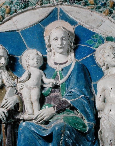 Neitsyt ja lapsi pyhimysten kanssa tekijältä Della Robbia (workshop of)
