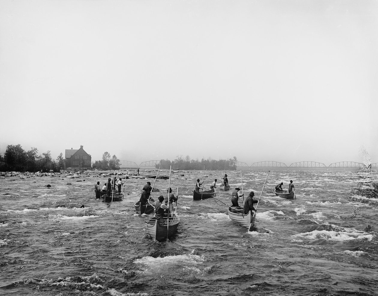 Intiaanit, jotka kalastavat koskessa, Sault Ste. Marie, Michigan, noin 1900 tekijältä Detroit Publishing Co.