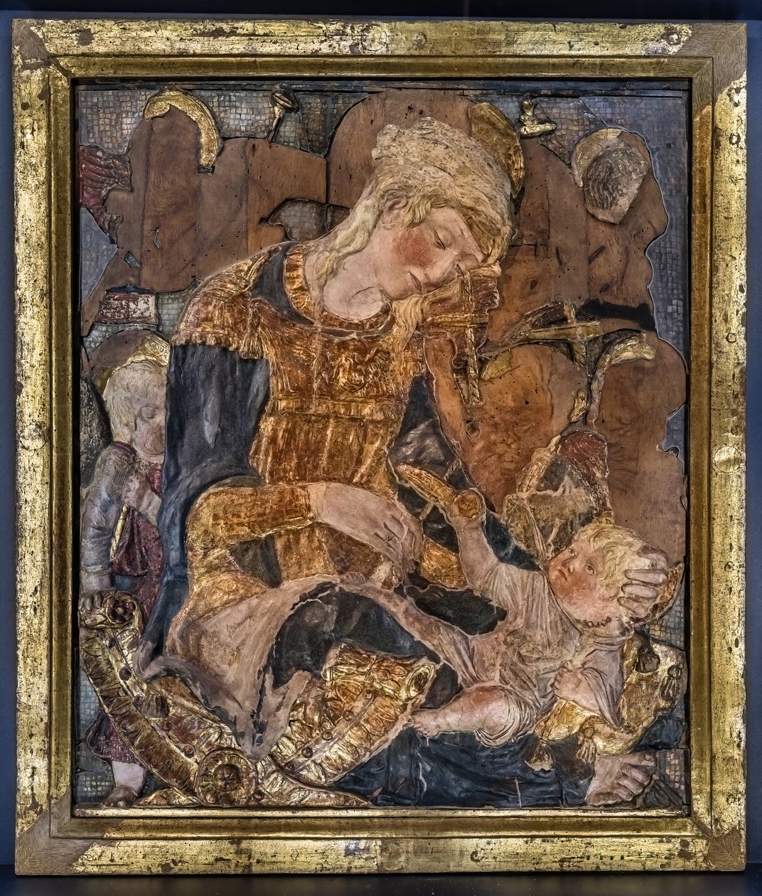 Madonna lapsineen ja enkeleineen, ennen vuotta 1443 (monivärinen stukki). tekijältä Donatello