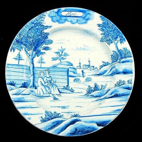 Delftware-levy, joka kuvaa toukokuuta (tinalasitettu keramiikka) tekijältä Dutch School