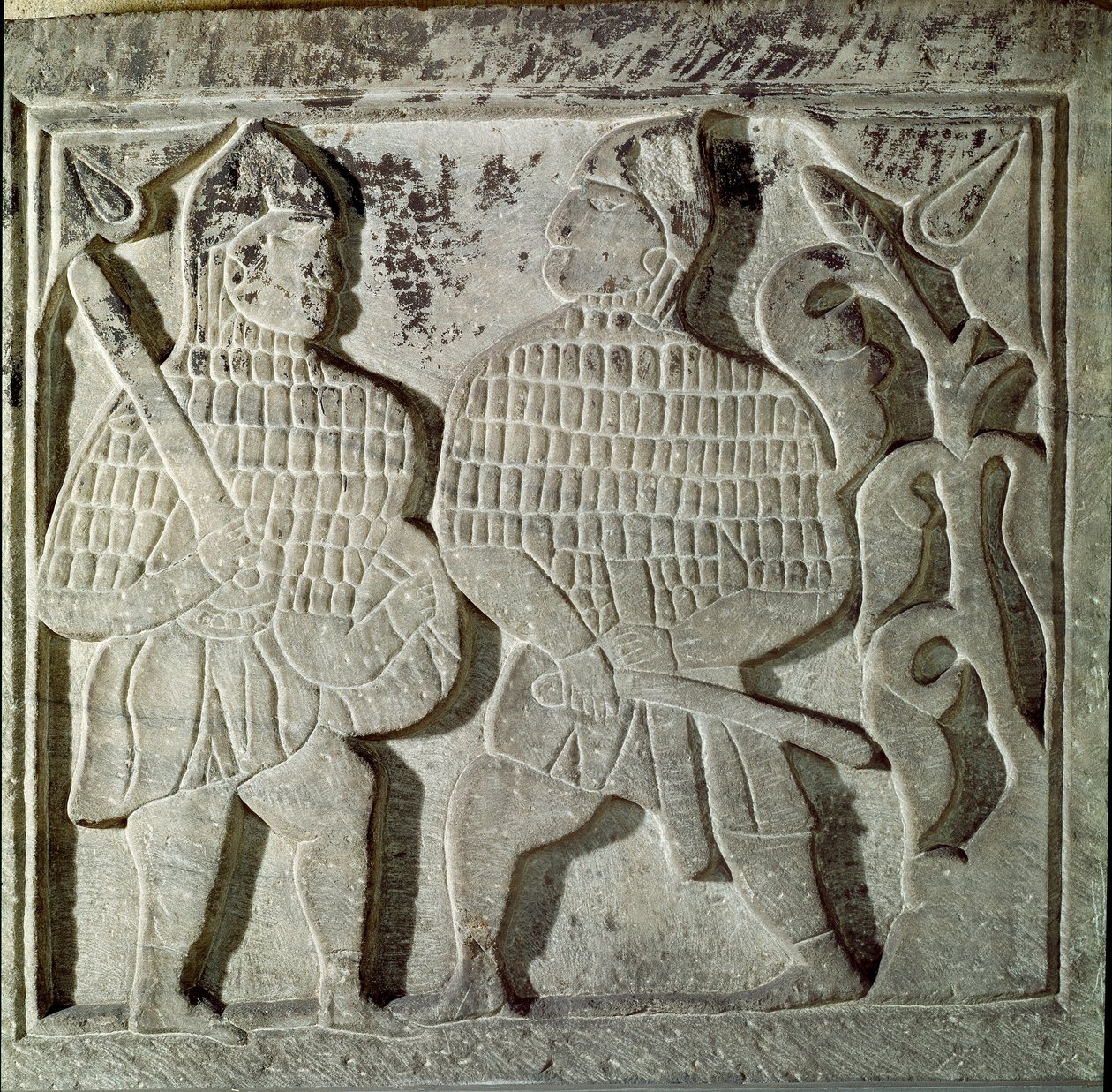 Seljukide Art (Seljukide tai Saljuqide): matala reliefi, joka edustaa kahta soturia. Konyasta, Turkista. 13. vuosisadalla. Turkin islamilainen taidemuseo, Istanbul tekijältä Dynasty Seljuq
