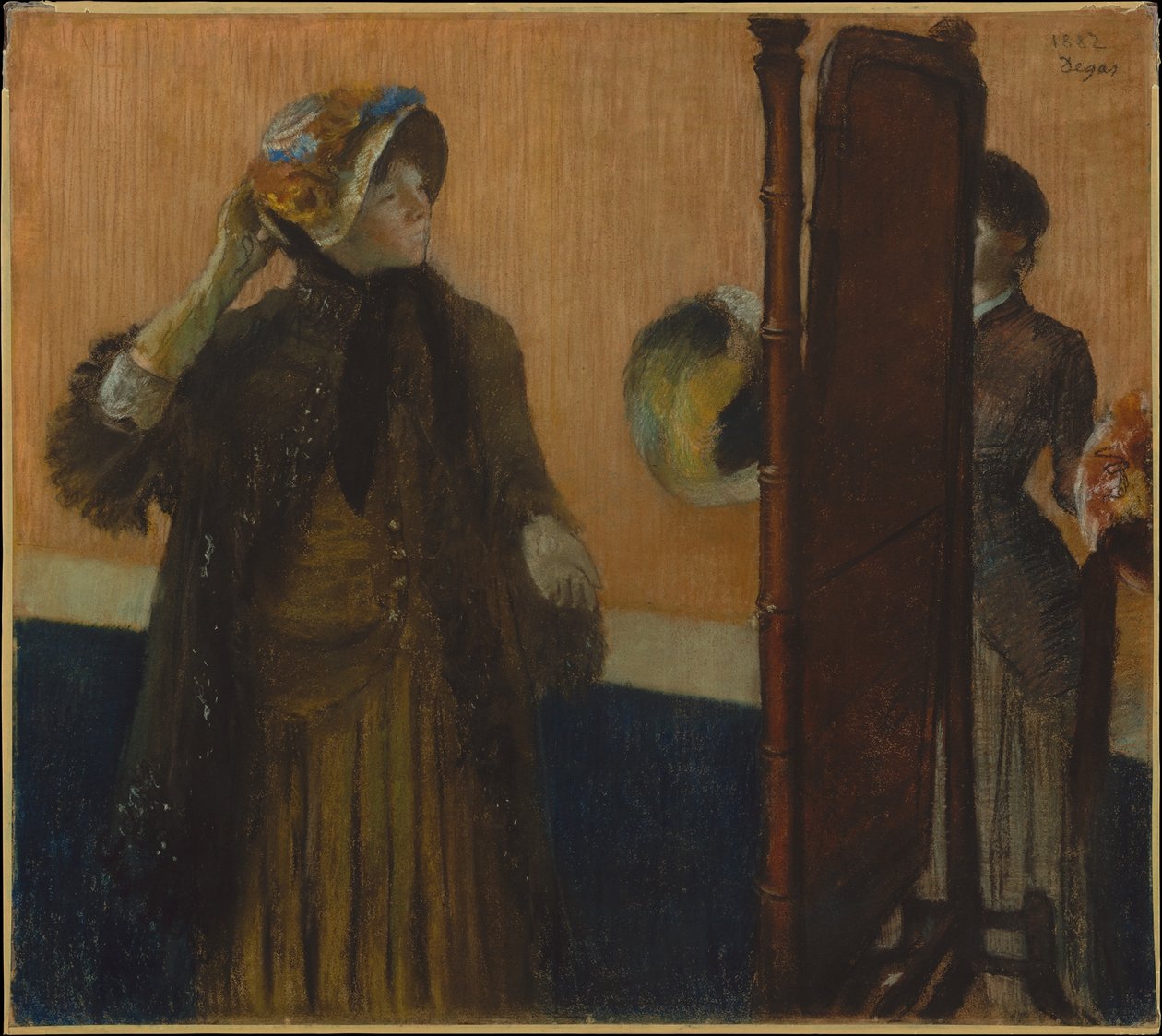Modistin luona tekijältä Edgar Degas