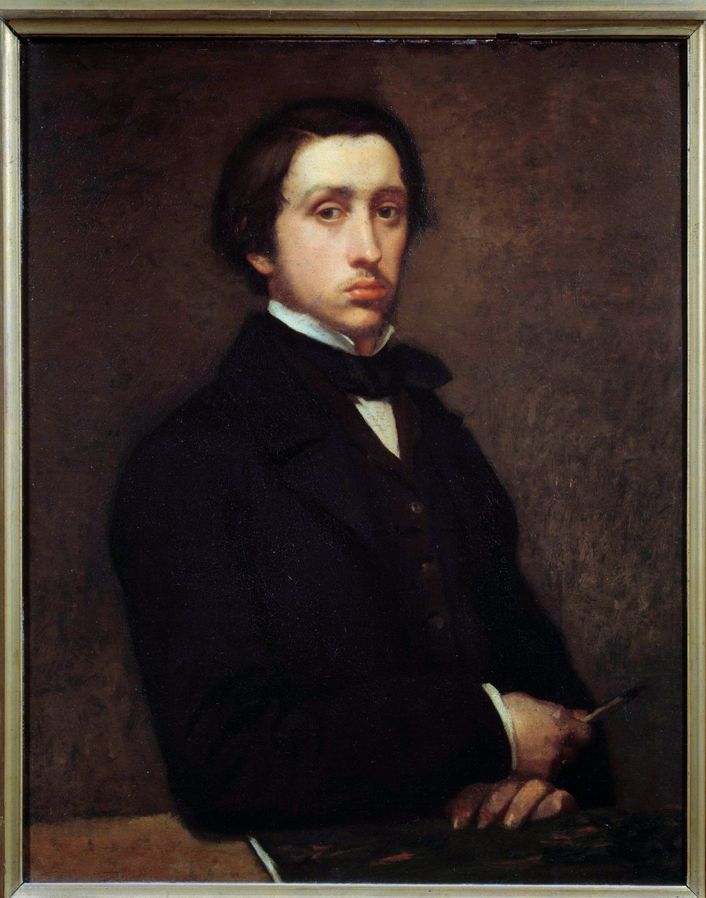 Omakuva tai Degas Edgar Degasin (1834-1917) muotokuvamaalauksessa 1855 su. 0,81x0,64 m Paris, musee d