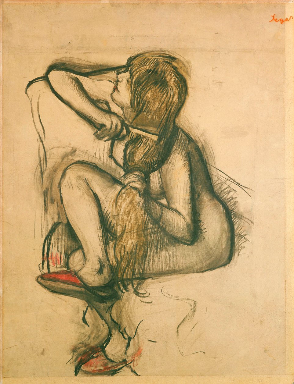 Nainen kampaa hiuksiaan tekijältä Edgar Degas
