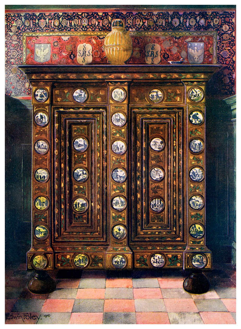 Saksanpähkinä upotekoristeinen ja maalatut Delft-tavaroiden medaljongit, 1910. tekijältä Edwin Foley