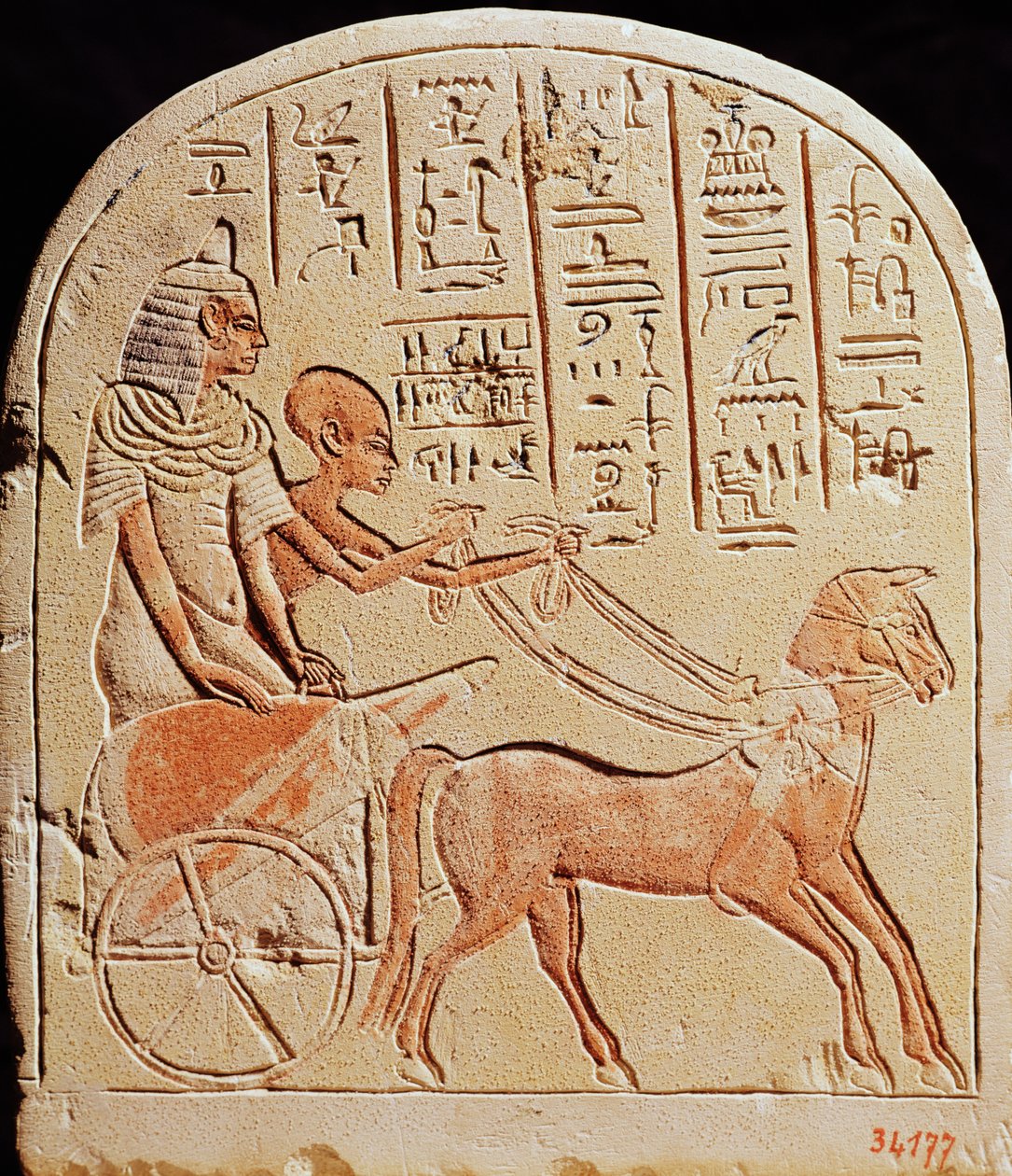 Stela kuvaa kirjuria ajamassa vaunuja Tell El-Amarnasta, Uudesta kuningaskunnasta, n. 1353-1337 eaa. tekijältä Egyptian 18th Dynasty