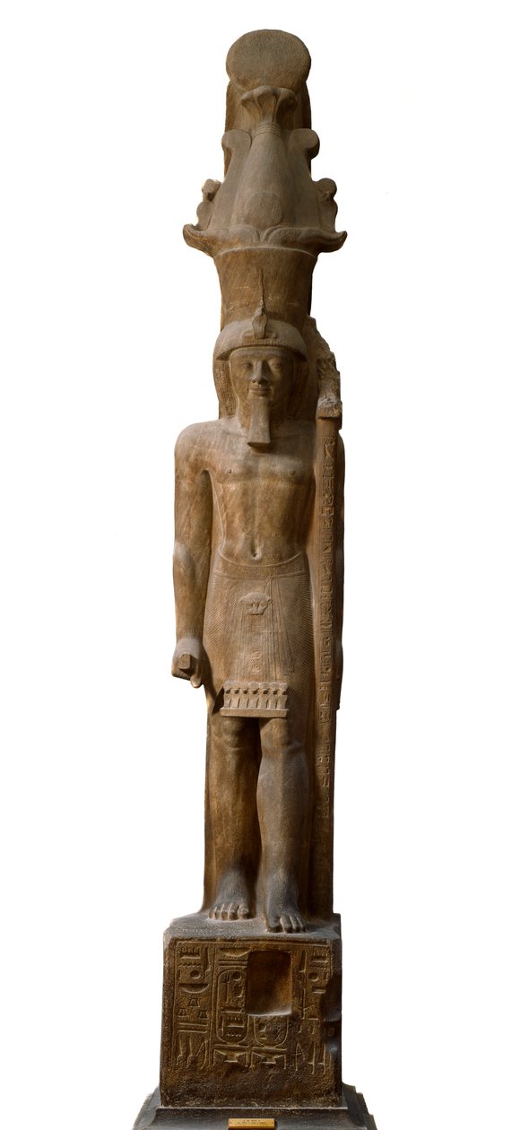 Egyptiläinen antiikki: 19. dynastian faarao Sethi II:n (Seti tai Sety) (1200-1194 eKr.) patsas vaaleanpunaisessa gresissä, siinä on valtikka, jossa on jumala Amonin symboli Dim. 465 cm. Torinon egyptiläinen museo. tekijältä Egyptian 19th Dynasty