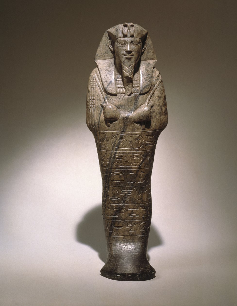 Senkamansekenin Ushabti, Etiopiasta (harmaa kalkkikivi) tekijältä Egyptian School
