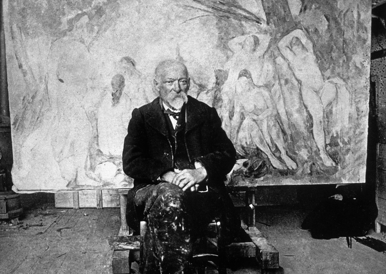 Paul Cezanne (1839-1906) ranskalainen taidemaalari vuonna 1904 yhden uimareita näyttävän kankaansa edessä (m/v kuva) tekijältä Emile Bernard