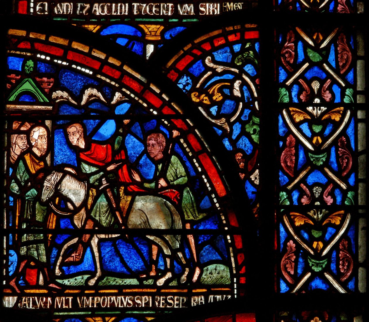 Yksityiskohta Miracle Window -ikkunasta, joka kuvaa kohtausta William of Gloucesterin pelastamisesta tekijältä English School