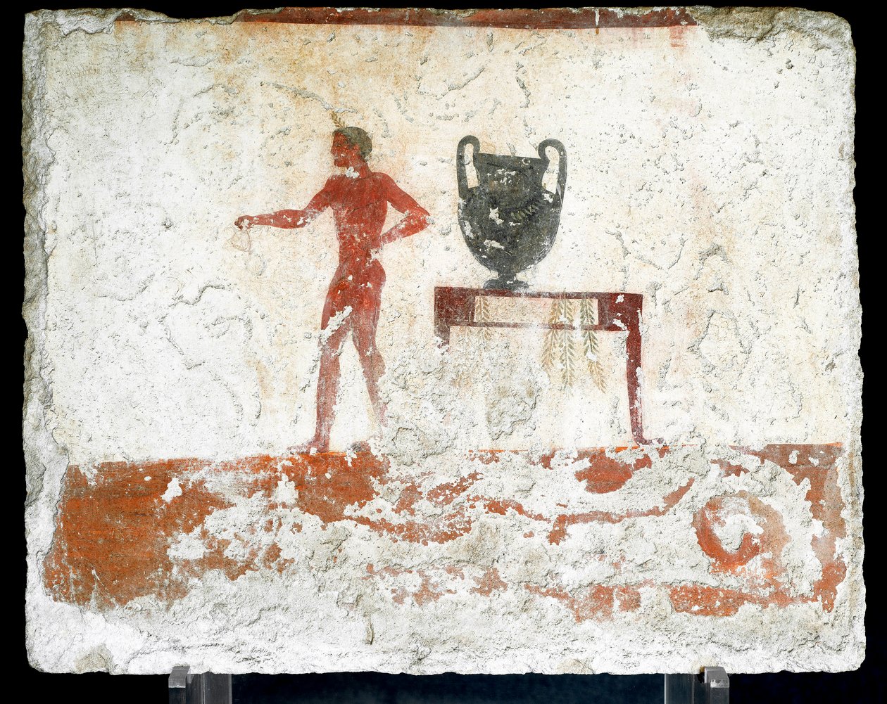 Etruskien taide: nuori alaston efebe lähellä pöytää, johon asetetaan maljakko. Fresko "sukeltajan" haudasta. Paestumin eteläiseltä hautausmaalta. 480-470 eaa. Museo Archeologico Nazionale, Paestum tekijältä Etruscan