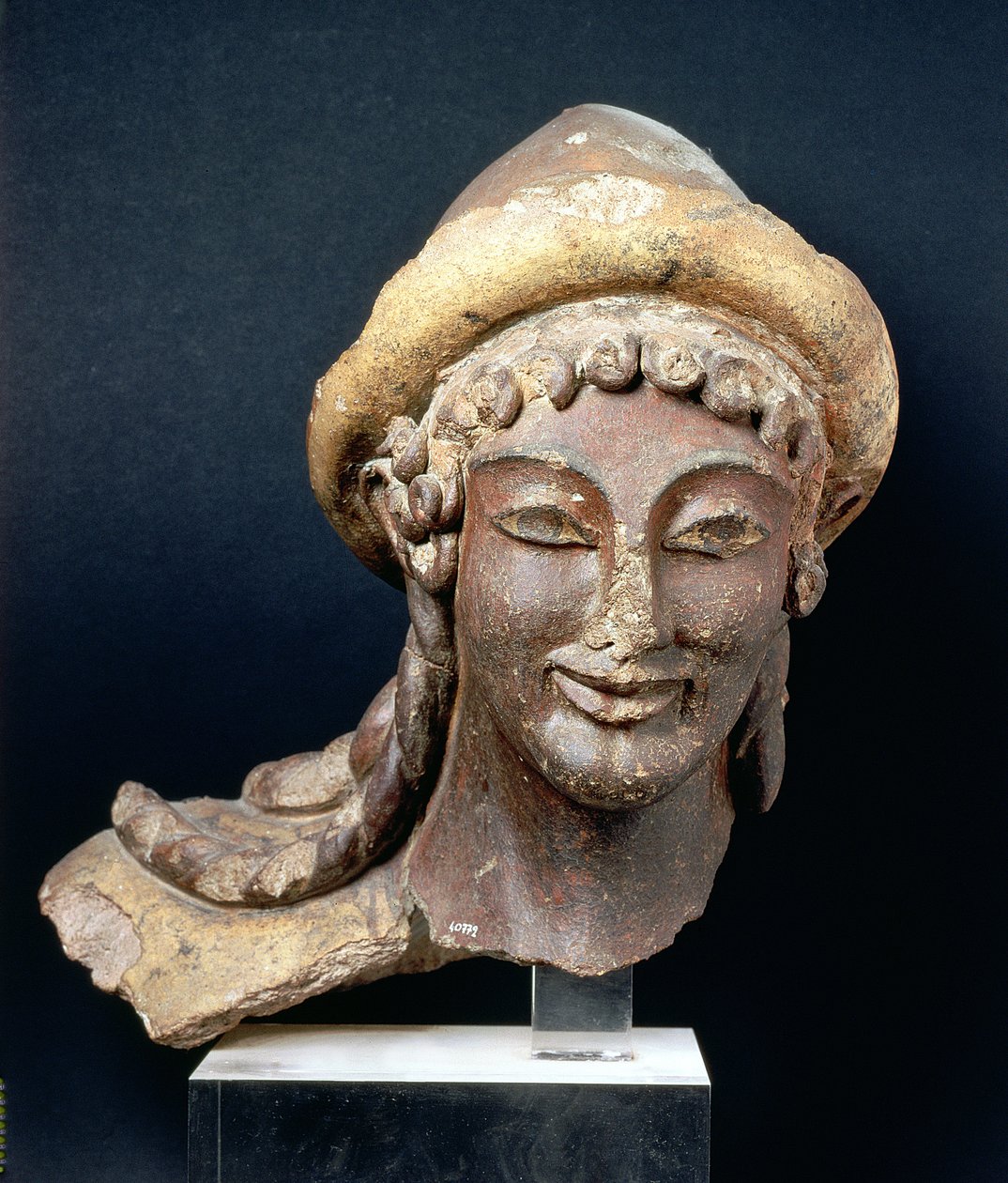 Pilosin päällä olevan Hermeksen pää, Portonaccion temppelistä, Veiistä, 510-500 eKr. (monivärinen terrakotta) tekijältä Etruscan