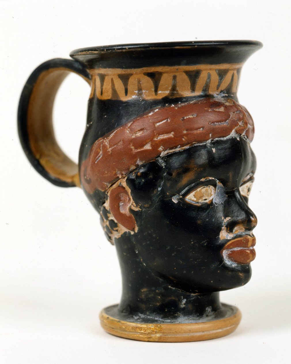 Mustan miehen pään muotoinen etruskien maljakko. Museo Nazionale de Tarquinia. tekijältä Etruscan Etruscan