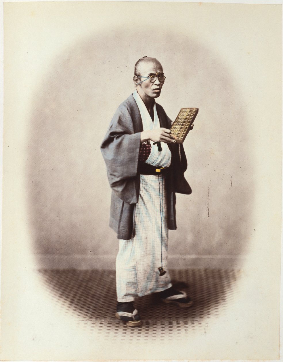 Virkailija, n. 1868 tekijältä Felice Beato