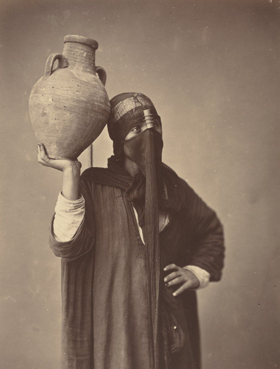 Vedenkuljettaja Kairossa, noin 1870 (kuva). tekijältä Félix Bonfils