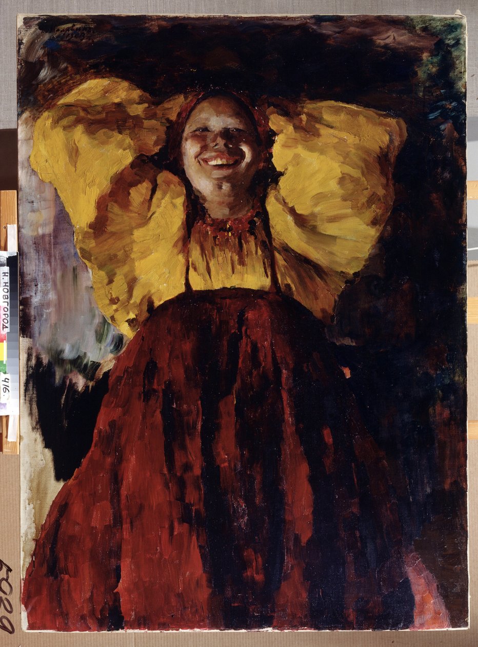 Nainen keltaisessa. Muotokuva iloisesta naisesta, jolla on yllään perinteinen mekko, kädet päänsä takana. Filipp Andreevich Maliavin (Maliavine) (tai Andrejevitš Maljavin) (1869-1940) maalaus, öljy kankaalle tekijältä Filipp Andreevich Maliavin