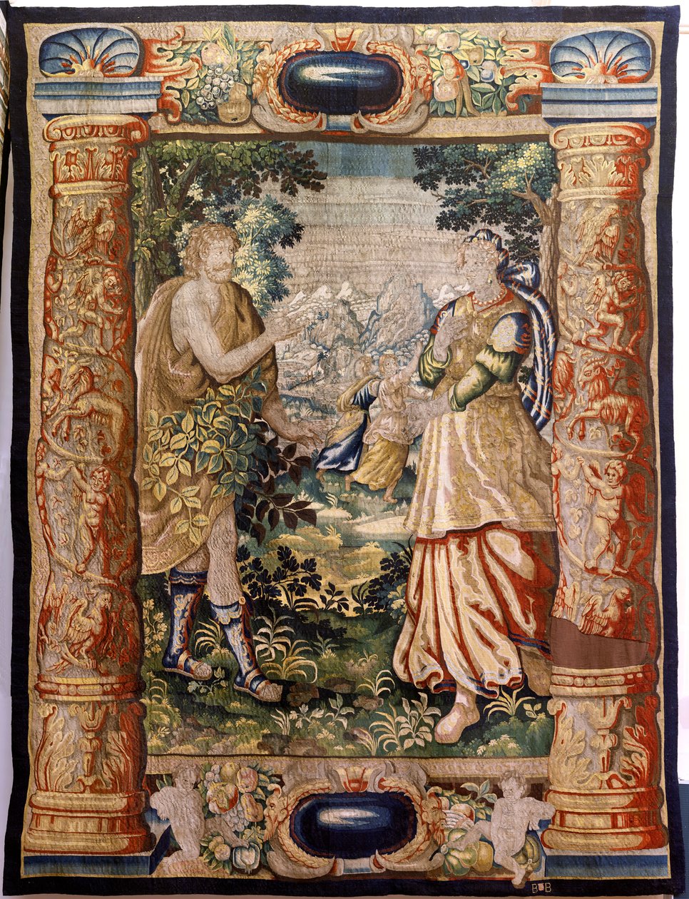 Flanderin kuvakudos. Sarja Gallantry (Galante). Mahtava kohtaus (Escena galante). Valmistus Brysselissä, 1600-luvun alku. Kangas Silkki ja villa, 5/6 loimi/cm. Koko 348 x 263 cm. Sijainti San Millán de la Cogollan kirkko, Oncala (Soria). Alkuperä lahjoitus tekijältä Flemish School
