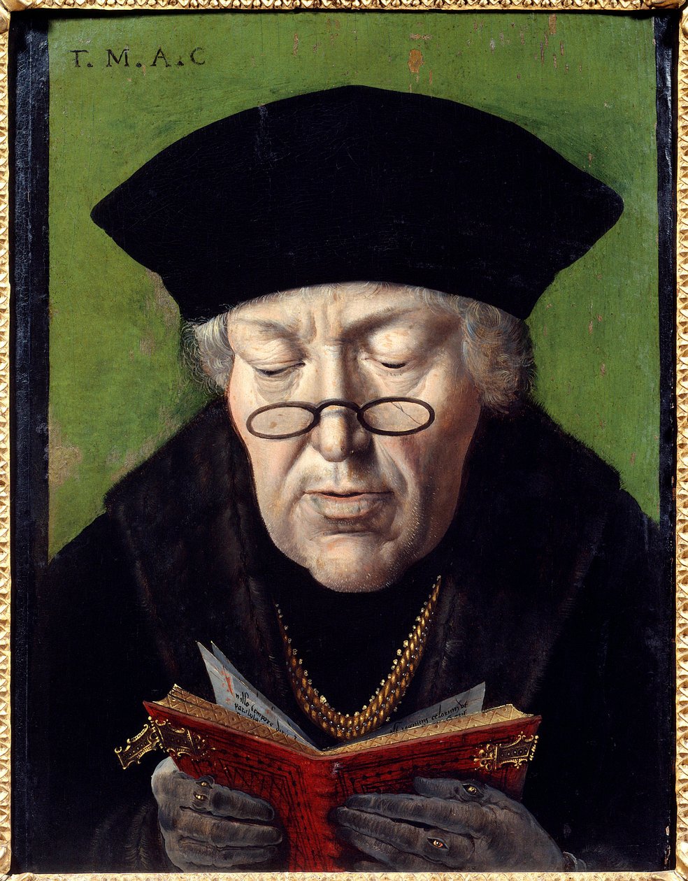 Humanistin Thomas Moren (1478-1535) muotokuva. Humanistia edustaa lasit lukemassa kirjaa. Flanderin koulun maalaus tekijältä Flemish School