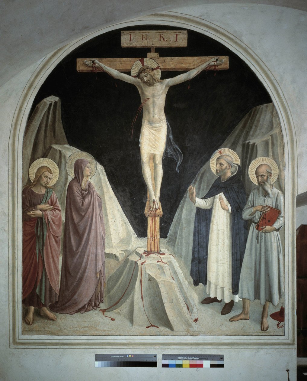 Kristuksen ristiinnaulitseminen Neitsyt Marian kanssa, evankelista pyhä Johannes, pyhä Hieronymus, pyhä Dominic. Kirjoitus "INRI" ristillä. Fresko Guido di Pietro tekijältä Fra Angelico