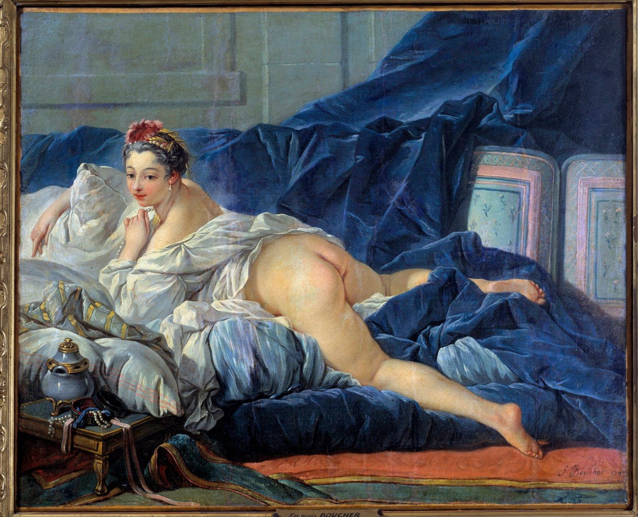 Odaliski nuori nainen istuu sohvalla. François Boucherin (1703-1770) maalaus 1752 Reims musee des Beaux Arts tekijältä François Boucher