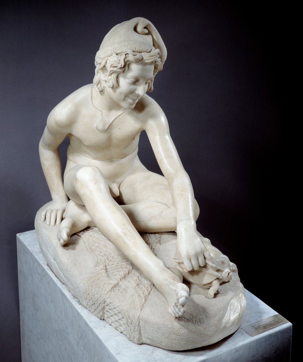Nuori napolilainen kalastaja leikkimässä kilpikonnan kanssa Francois Ruden (1784-1855) marmoriveistos 1831 Pariisi, Musee du Louvre tekijältä Francois Rude