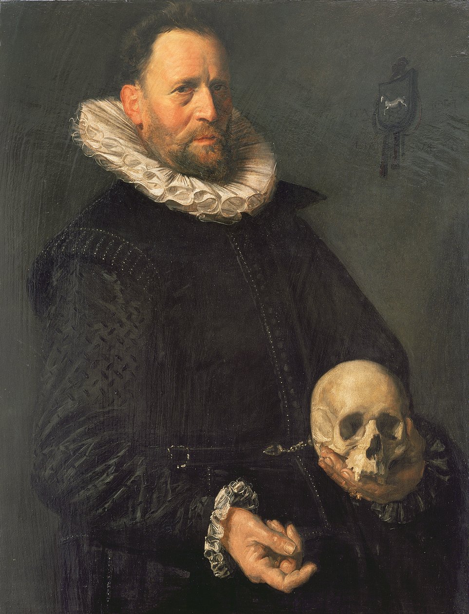 Muotokuva miehestä, jolla on kallo, n. 1611-12 (paneeli) tekijältä Frans Hals