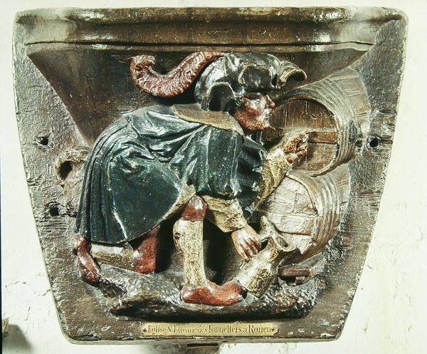 Misericord kuorokopista, joka kuvaa miestä testaamassa viiniä, Saint-Etienne des Tonneliersin kirkosta, Rouen (monivärinen puu) tekijältä French School